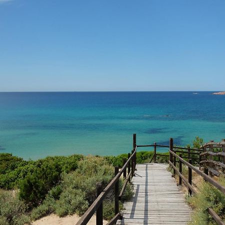 Calarossa Sardinia Apartments Isola Rossa Bagian luar foto
