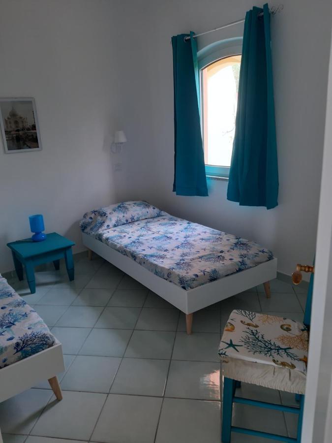 Calarossa Sardinia Apartments Isola Rossa Bagian luar foto