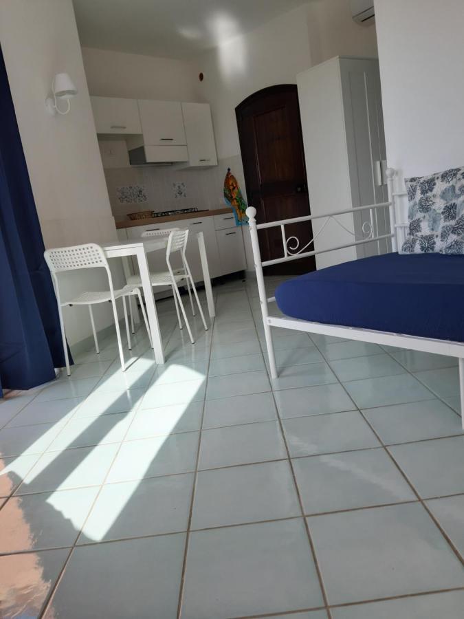 Calarossa Sardinia Apartments Isola Rossa Bagian luar foto