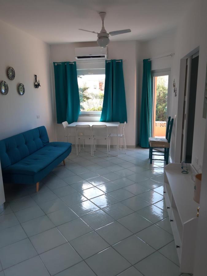 Calarossa Sardinia Apartments Isola Rossa Bagian luar foto