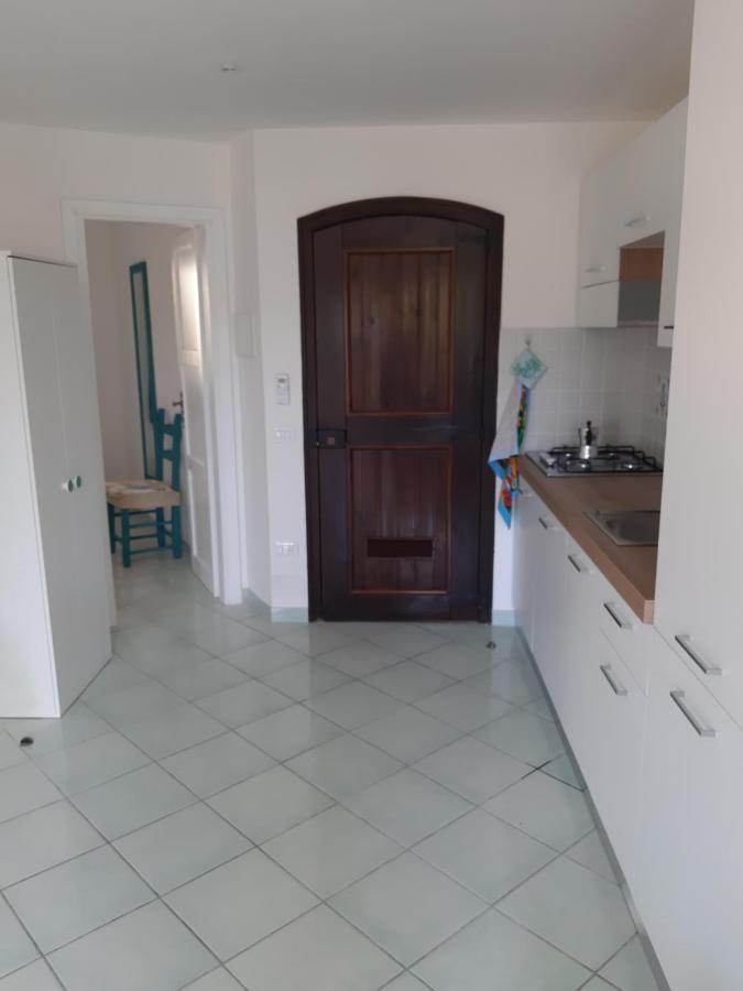 Calarossa Sardinia Apartments Isola Rossa Bagian luar foto