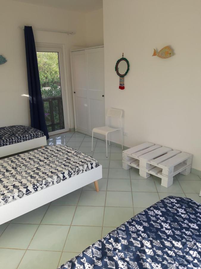 Calarossa Sardinia Apartments Isola Rossa Bagian luar foto