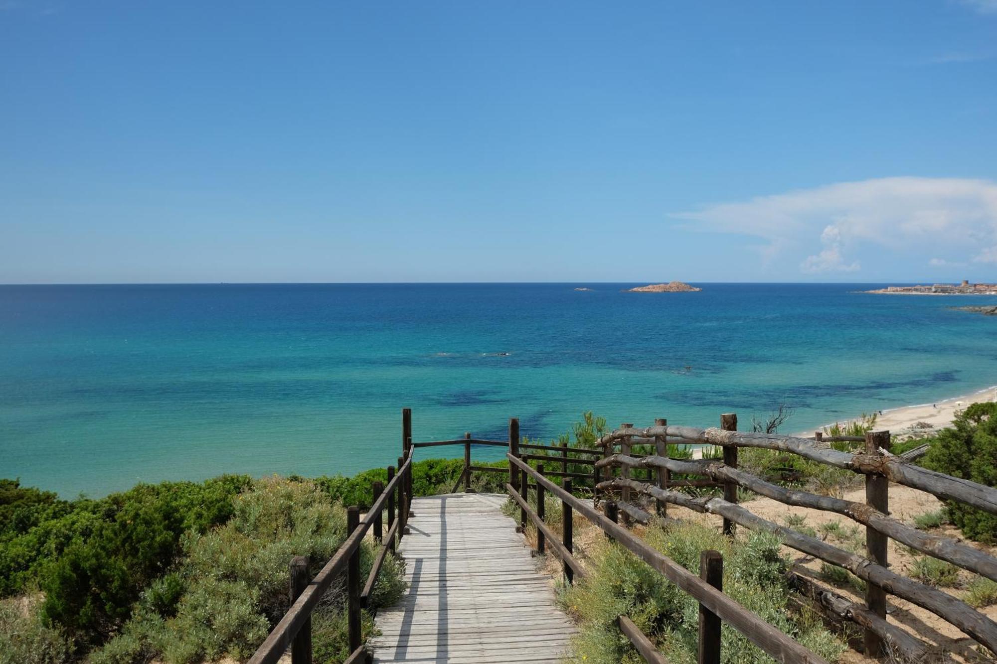 Calarossa Sardinia Apartments Isola Rossa Bagian luar foto