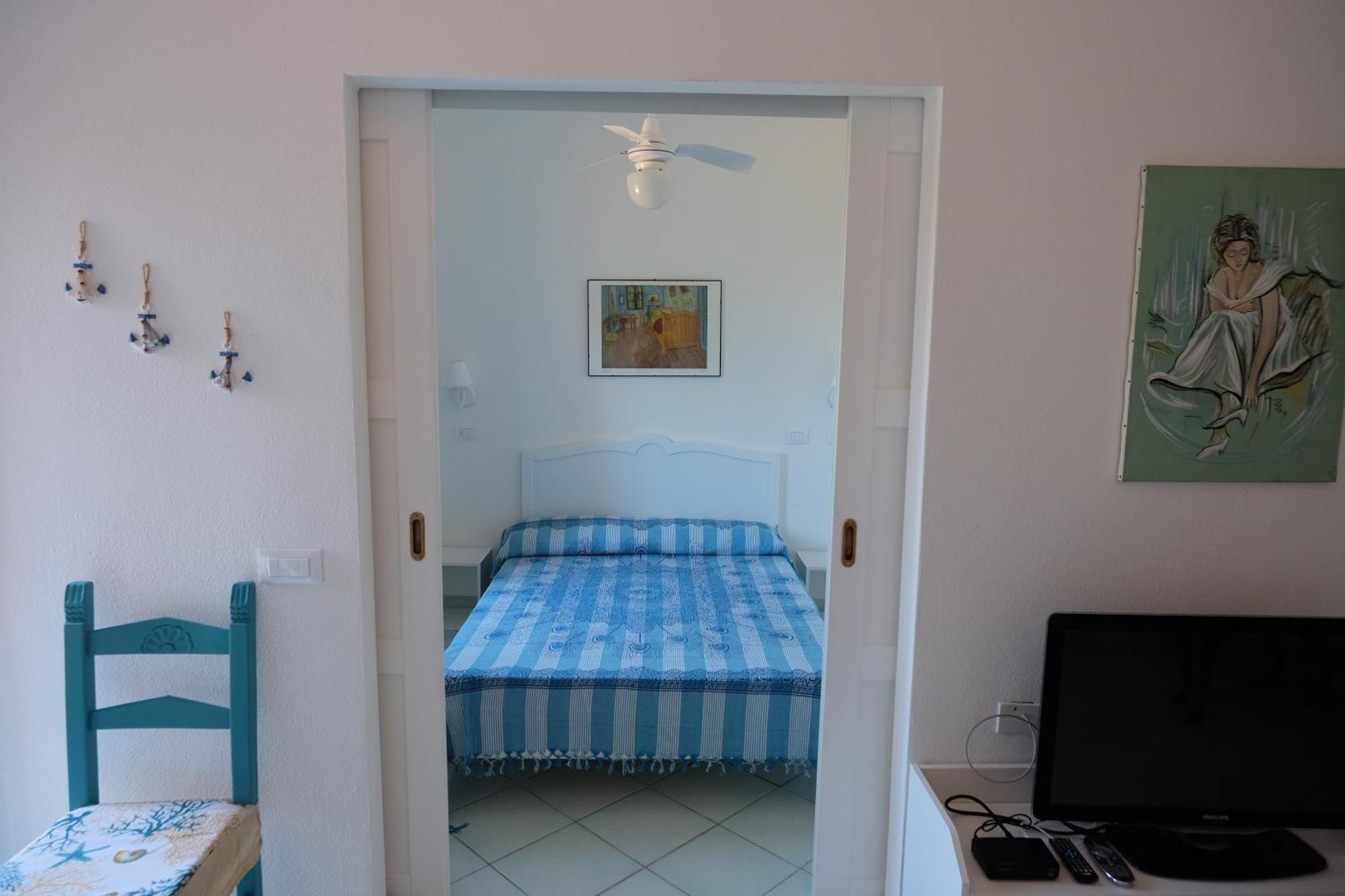 Calarossa Sardinia Apartments Isola Rossa Bagian luar foto