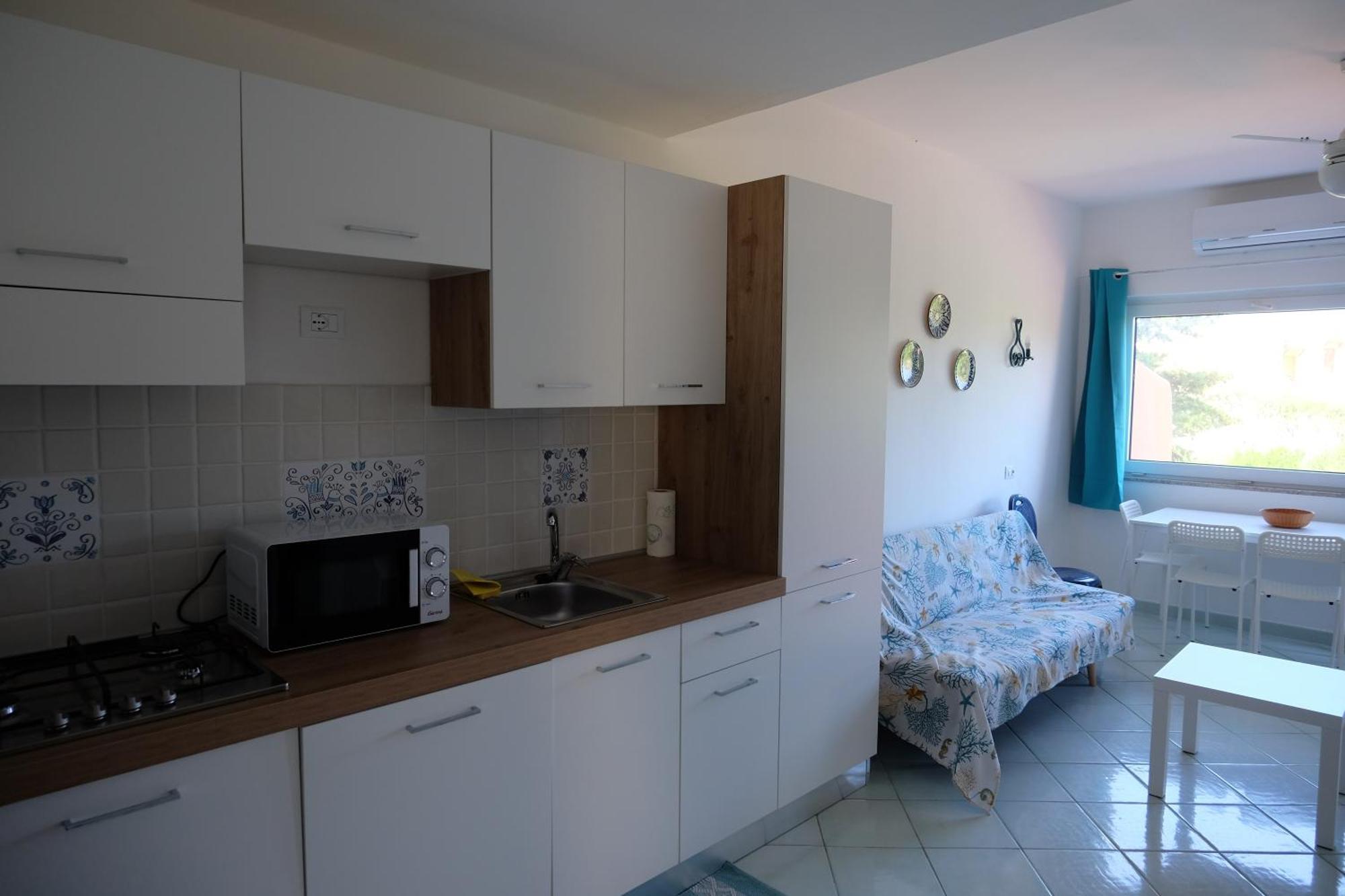 Calarossa Sardinia Apartments Isola Rossa Bagian luar foto