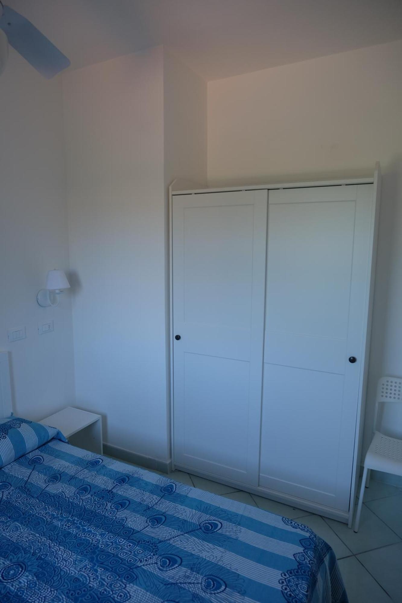 Calarossa Sardinia Apartments Isola Rossa Bagian luar foto