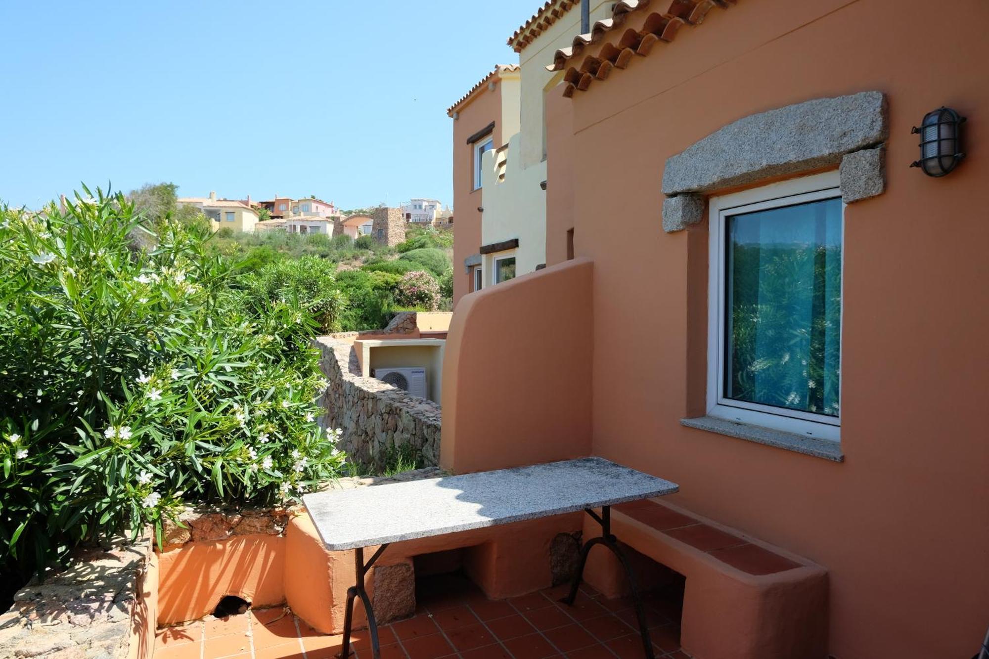 Calarossa Sardinia Apartments Isola Rossa Bagian luar foto