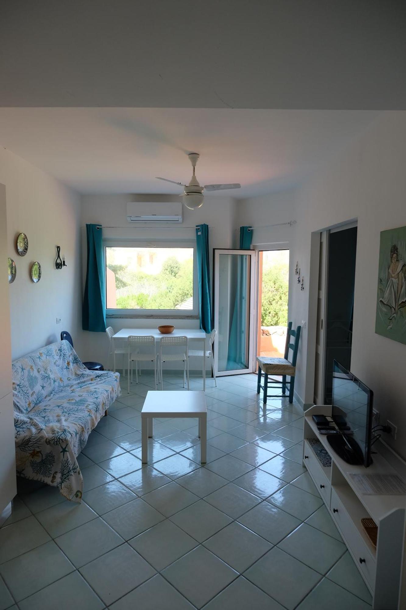 Calarossa Sardinia Apartments Isola Rossa Bagian luar foto
