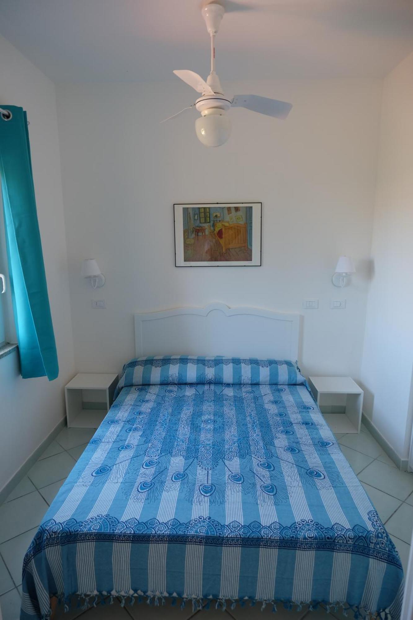 Calarossa Sardinia Apartments Isola Rossa Bagian luar foto