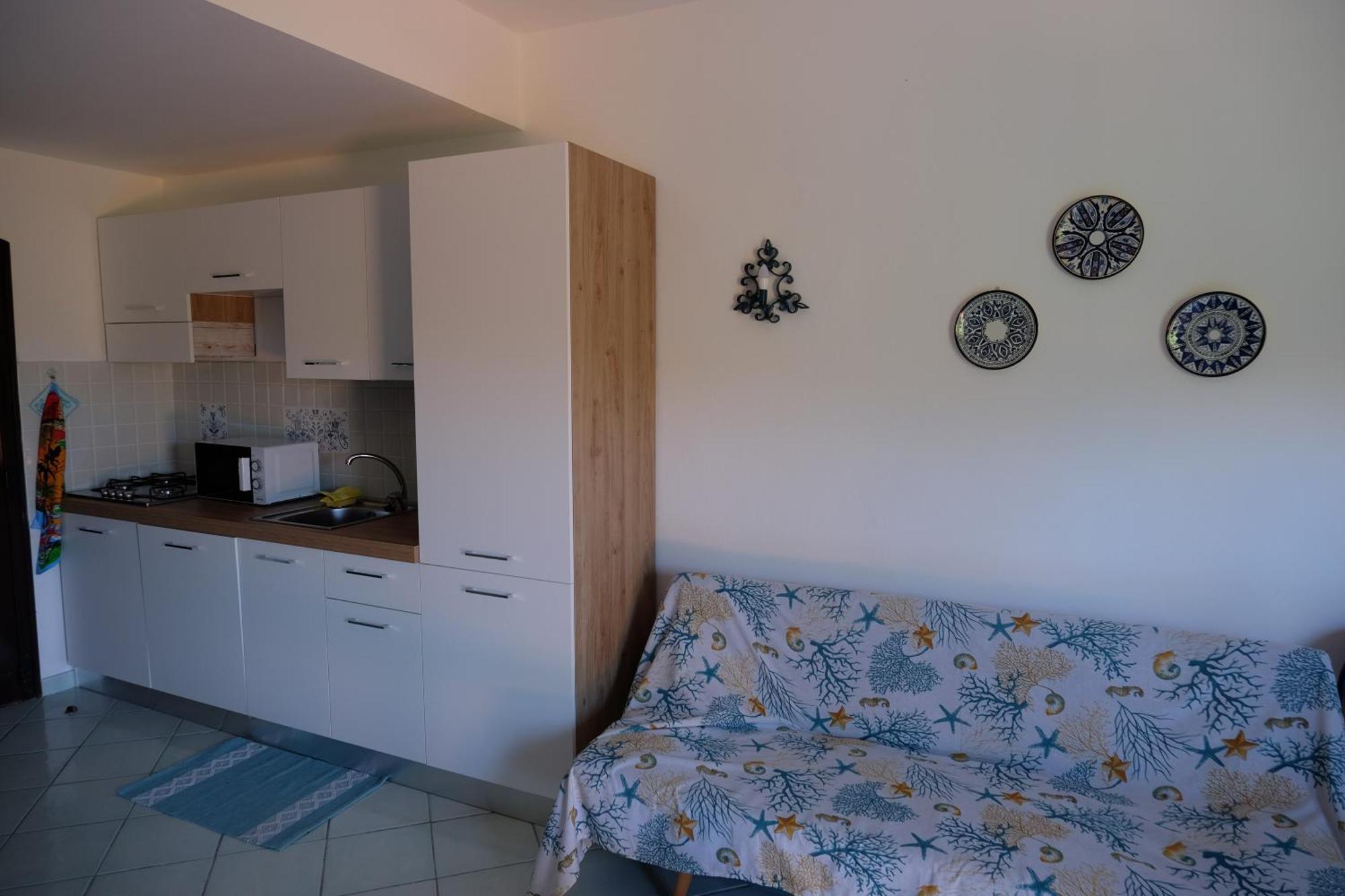 Calarossa Sardinia Apartments Isola Rossa Bagian luar foto