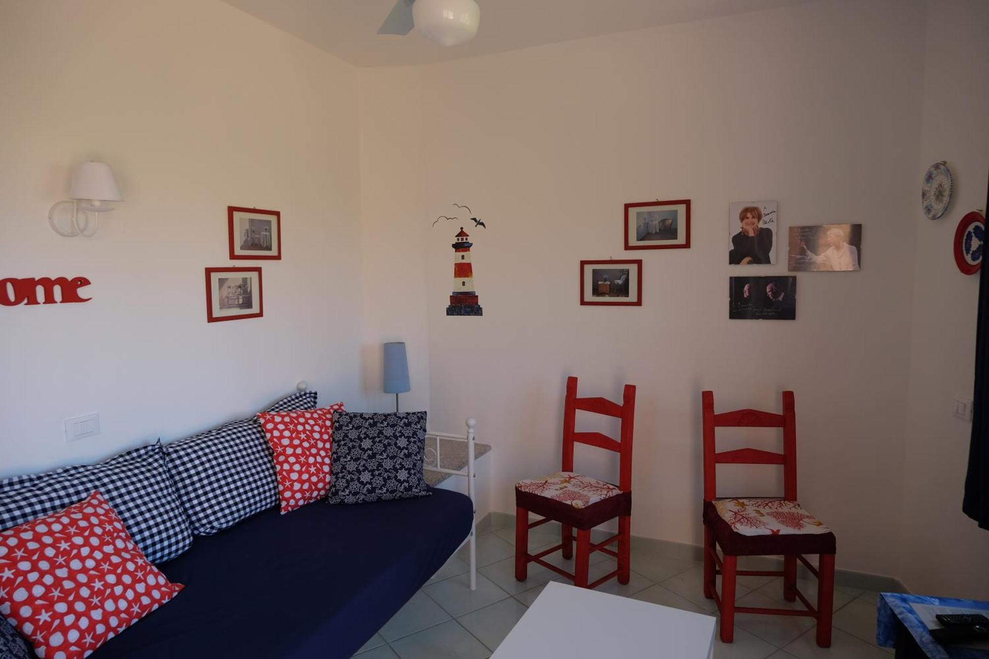Calarossa Sardinia Apartments Isola Rossa Bagian luar foto