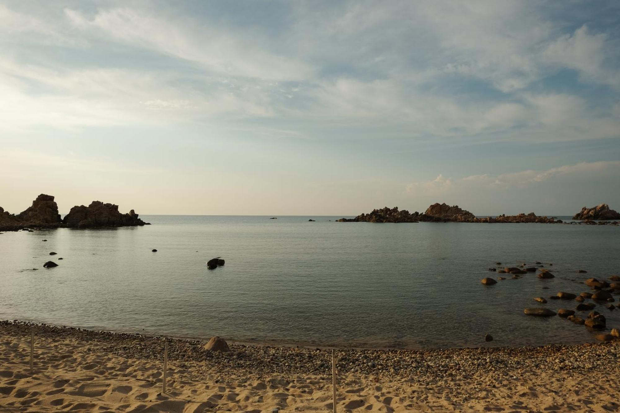 Calarossa Sardinia Apartments Isola Rossa Bagian luar foto