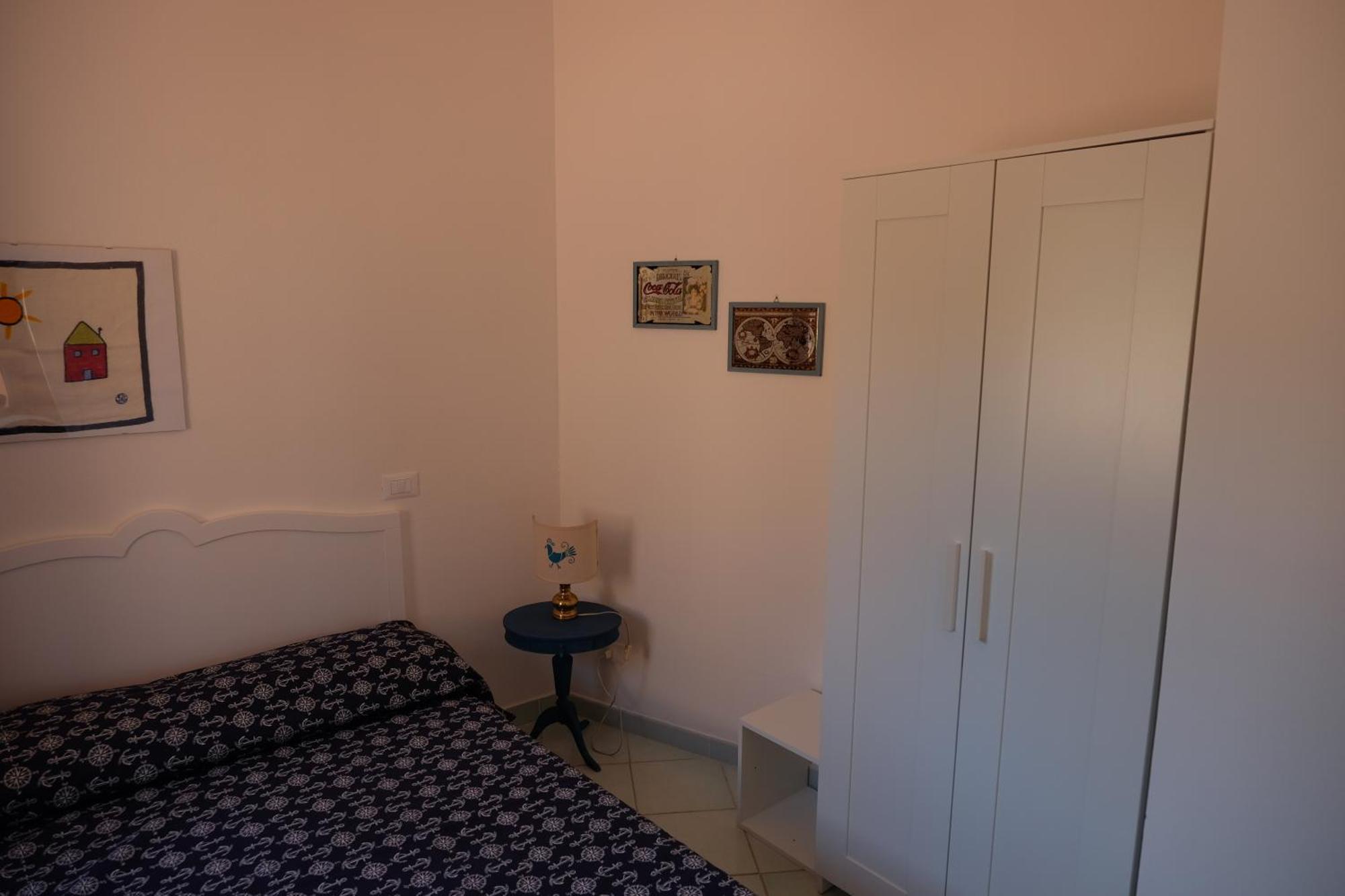 Calarossa Sardinia Apartments Isola Rossa Bagian luar foto