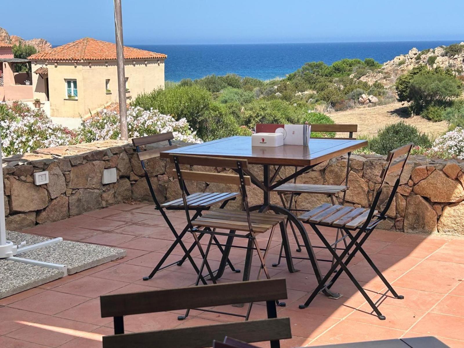 Calarossa Sardinia Apartments Isola Rossa Bagian luar foto
